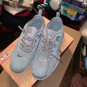 Teal Nike running shoes